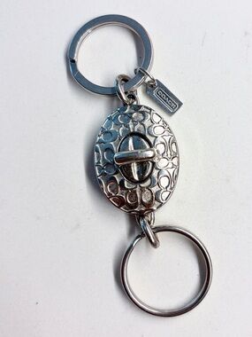 COACH Silver Signature Embossed Turnlock Valet Key Ring Fob